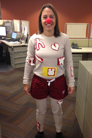Landscape Structures employee Michelle Krenik dressed as the operation game man.