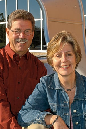 Portrait of Barb and Steve King, founders of Landscape Structures. 
